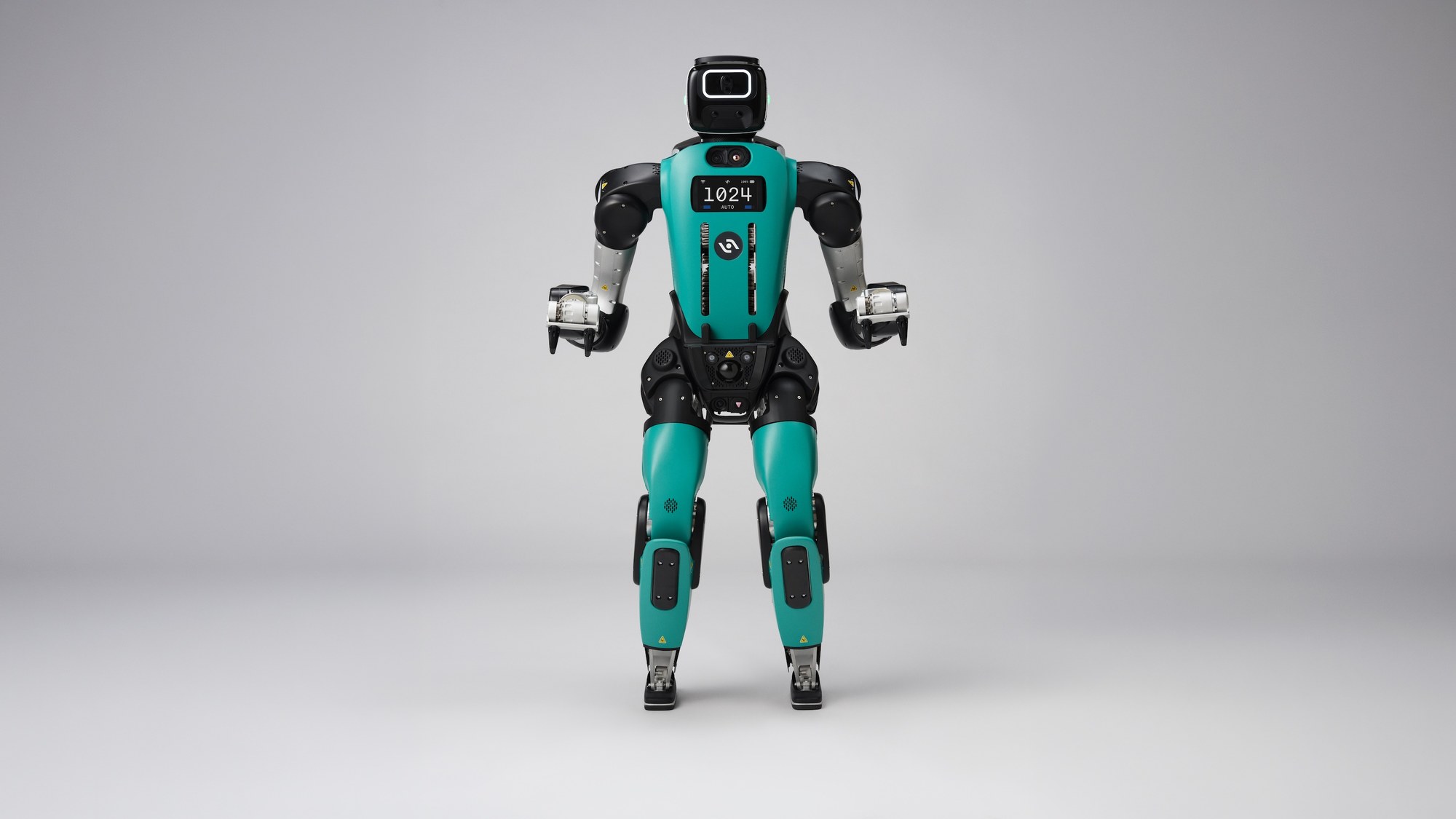 Front studio photo of Agility Digit 5, teal torso, black head, compact grippers