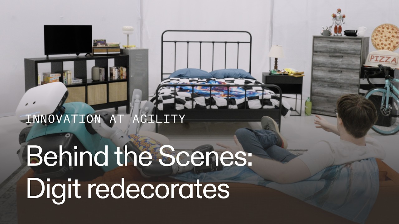 Digit in a staged bedroom set with title overlay Behind the Scenes: Digit redecorates