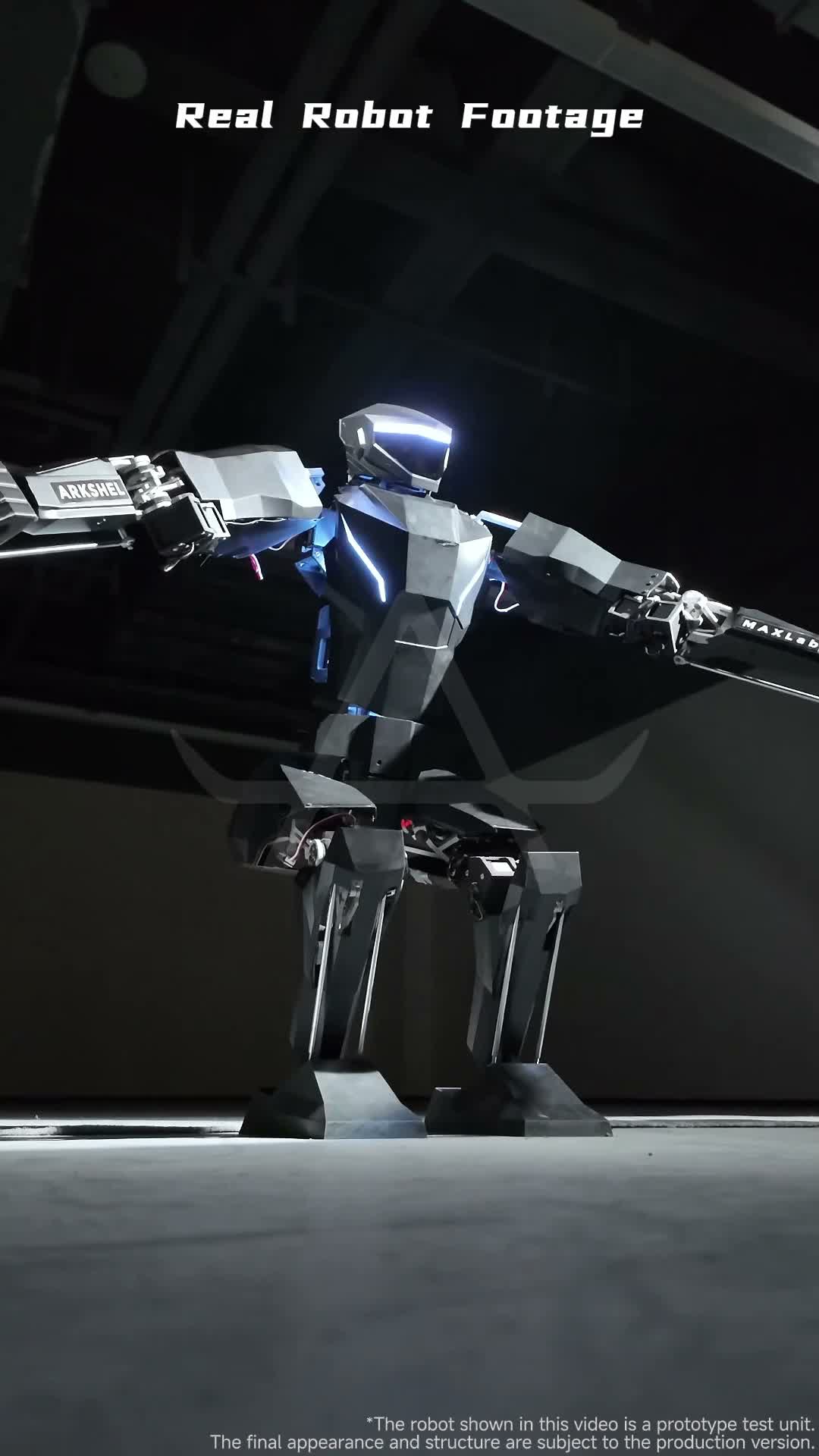 MX01 prototype standing with arms out in a warehouse