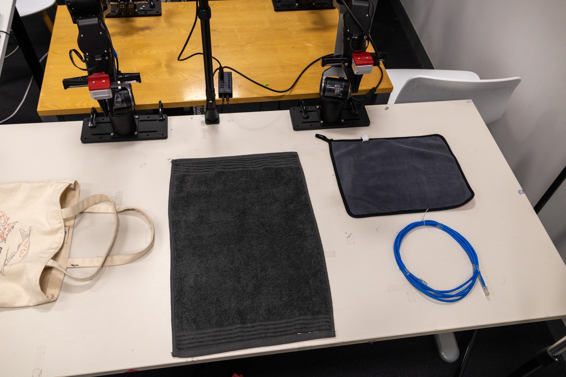 Real robot towel manipulation under AutoIntervene