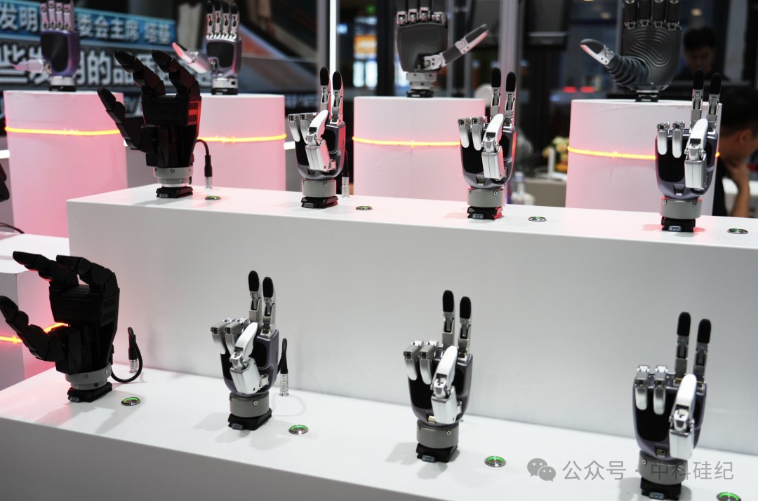 Rows of CasiaHand dexterous robot hands on white pedestals at a trade-show booth