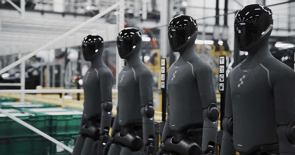 Line of Figure 03 humanoid robots in a manufacturing facility