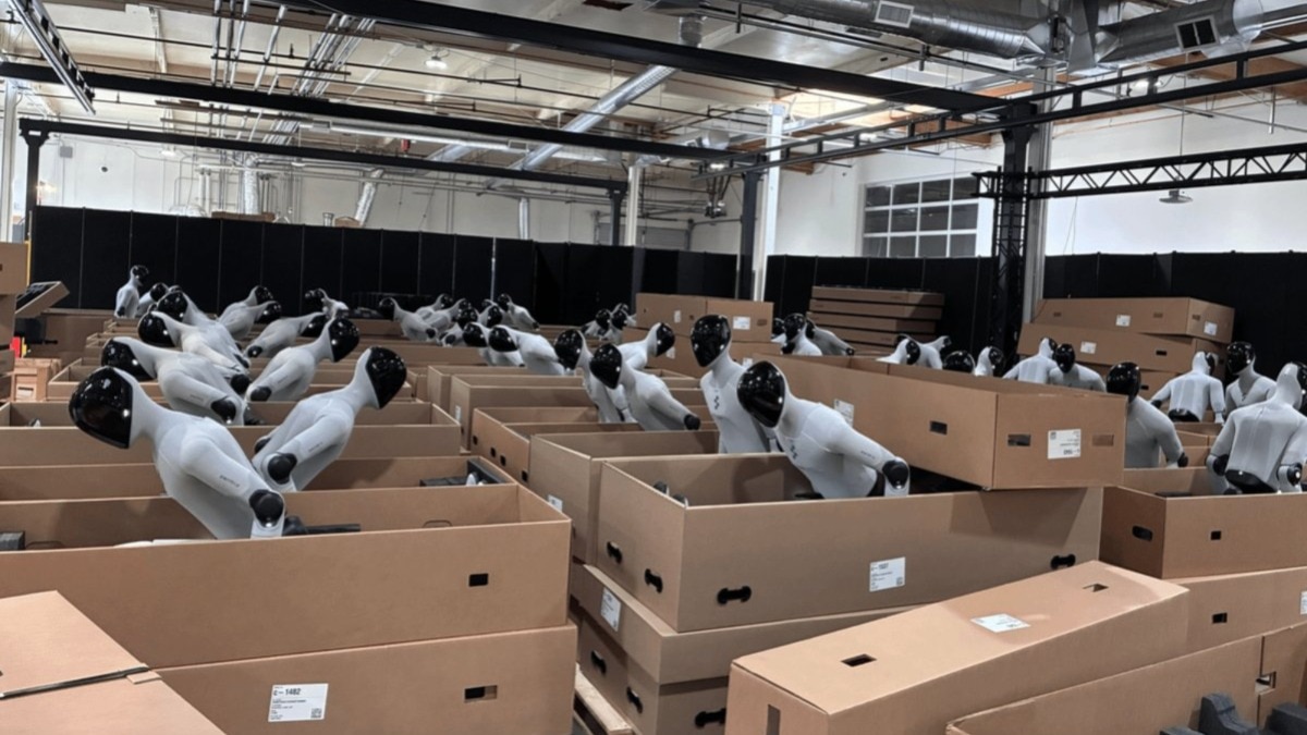 Figure AI humanoid robots on a factory floor