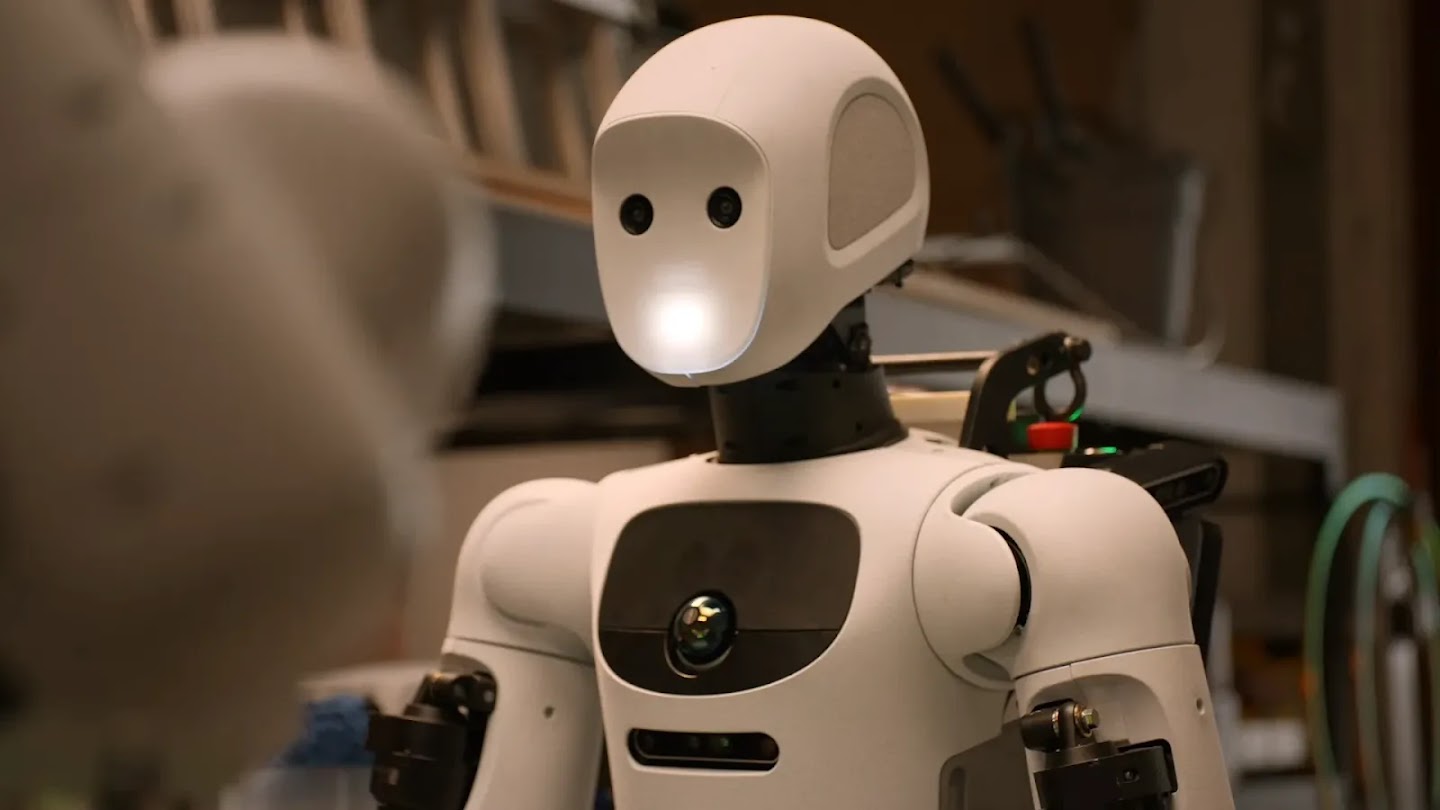 Close-up of white humanoid head and chest camera