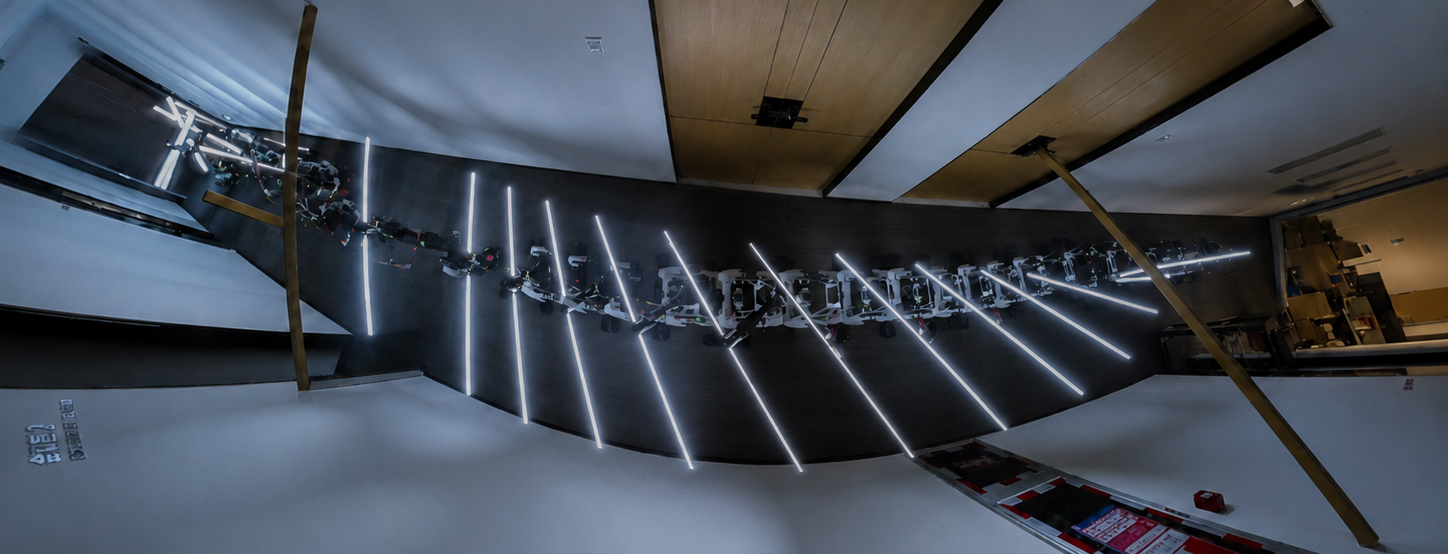 Mobile manipulator carrying elongated payload through narrow corridor with beams