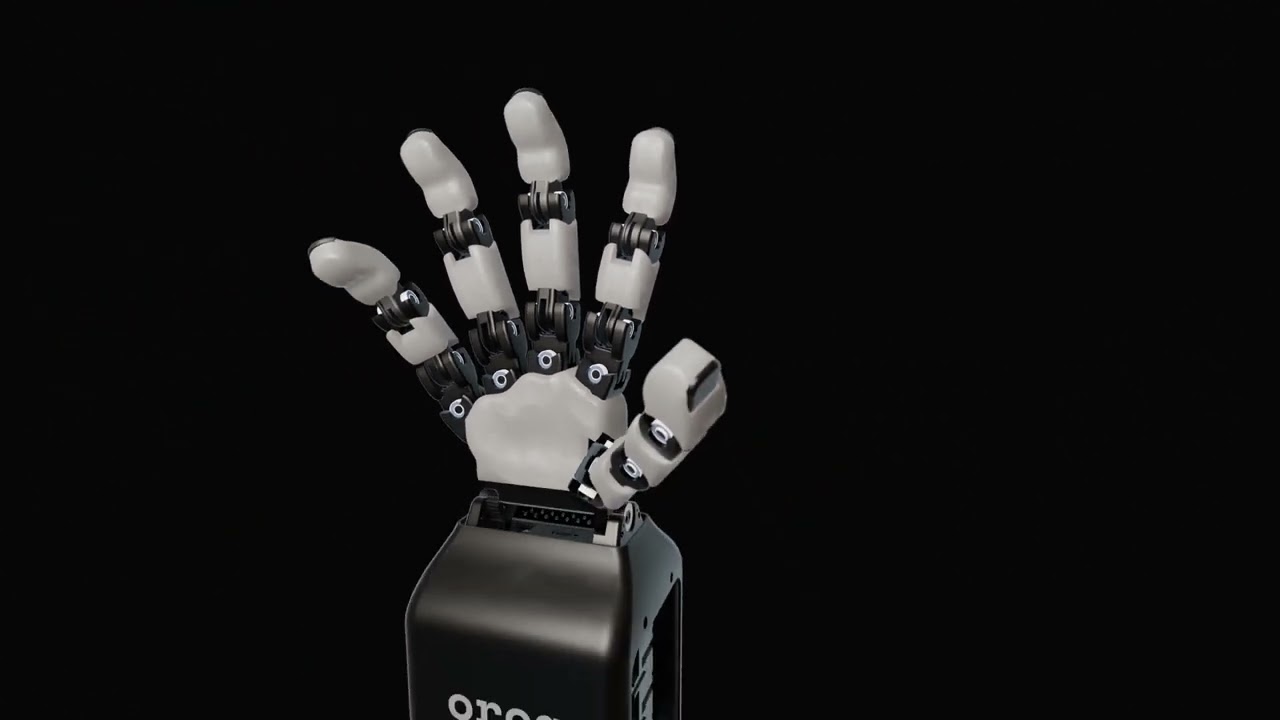 ORCA branded robotic hand with white soft fingers against black background