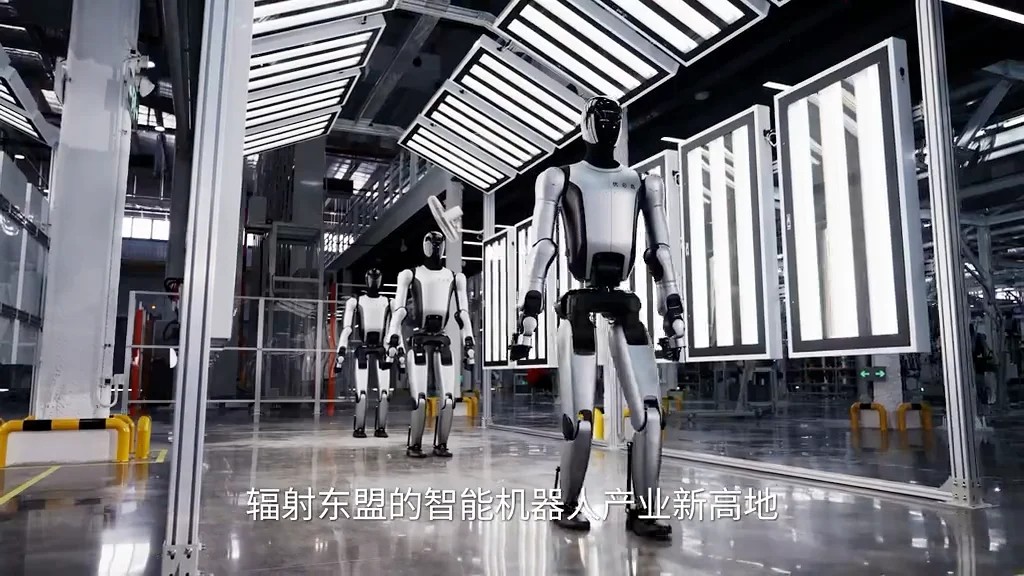 Three Walker S humanoids walking through a lighting inspection tunnel