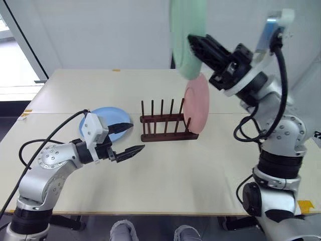 Unitree G1 dual-arm tabletop view placing a plate onto a dish rack